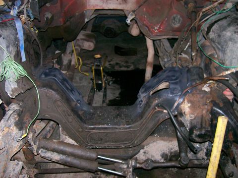 1982 Ford Bronco - Underside view of a vehicle's engine bay, showing suspension and engine mounts.