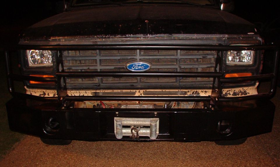 I got the winch back on just before supper, so it was dark when I took this.

Those "diamond-cut" headlights aren't much brighter than this when they're turned on.