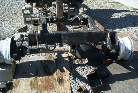 1982 Toyota 4Runner - Disassembled vehicle chassis and axles are shown, with no visible year identification.