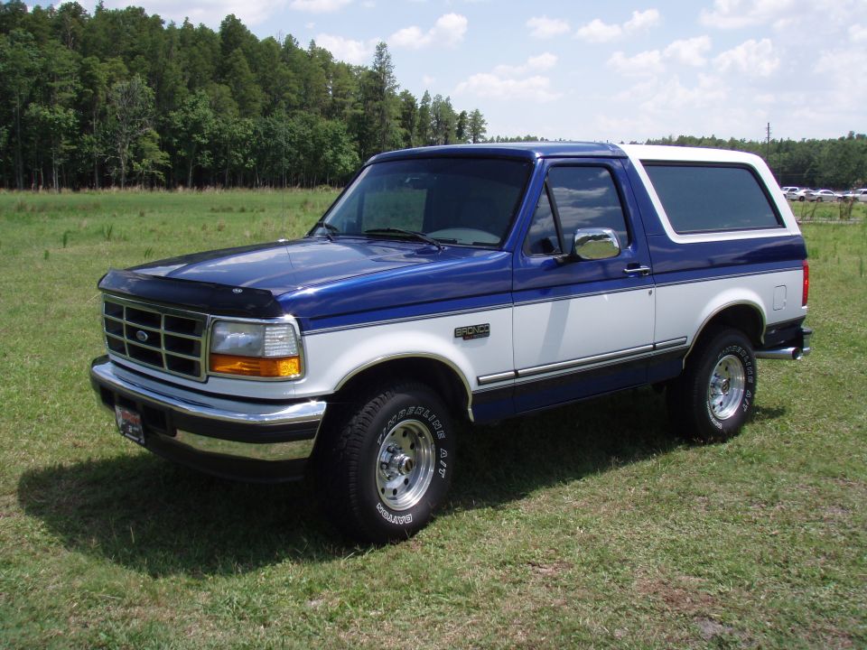 Blue and white 1996 Ford Bronco, 3/4 front view