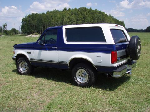 1996 Ford Bronco - This 1996 Ford Bronco is shown from a three-quarter front view, parked outdoors.