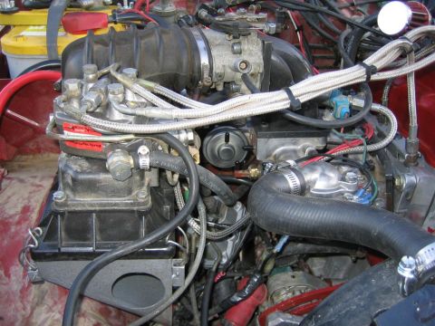 1987 Suzuki Samurai - Engine fuel injection system components are visible in this close-up view.