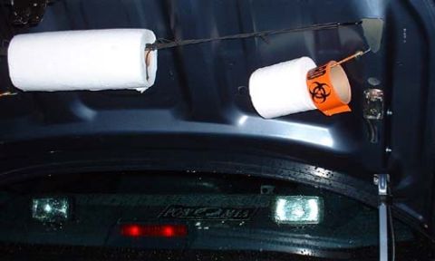 1996 Ford Crown Victoria - The ever present paper towels and toilet paper (The Biohazard tape is for afterwards!)The strobe on the right lights up when the trunk is o…