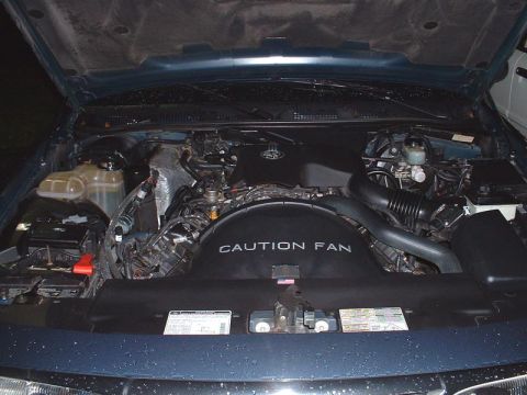 1996 Ford Crown Victoria - I got chrome caps for the Radiator and the Brake reserviors from www.50resto.com. I took a Testors paint pen and did the raised lettering a…