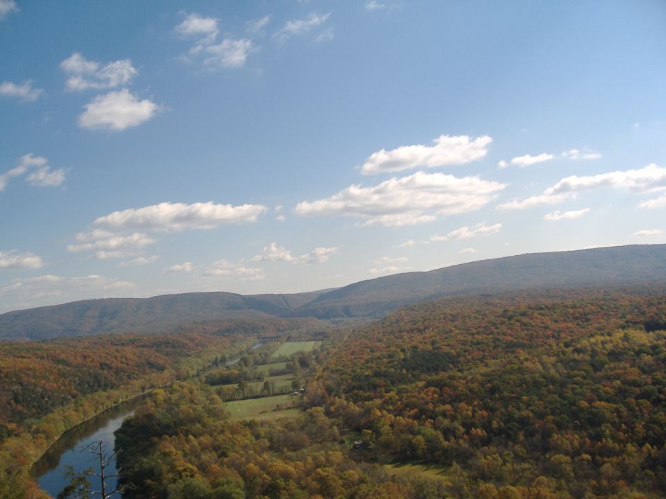 Autumn landscape with river and mountains