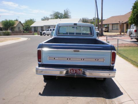 1978 Ford F-250 - This classic Ford pickup truck is parked on a residential street on a sunny day.