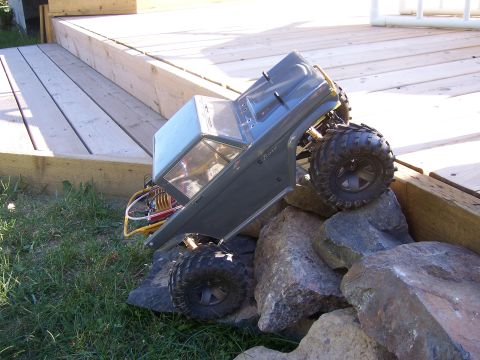 1996 Ford Bronco - This remote control rock crawler is navigating a rocky obstacle course.