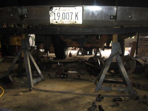 1988 Ford Bronco - new i-beam drop brackets on new pit man arm on axle on the ground brake lines disconnected always use jack stands