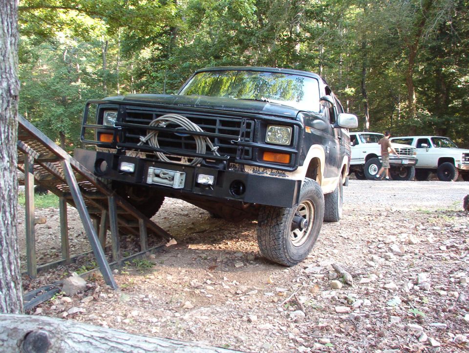 These pics are even more interesting now, in hindsight.  My bumpers kept me from even really getting ON the ramp, but they didn't interfere with anything on the trails.

That's Jason in the background walking in front of Ben's truck to his Blazer.