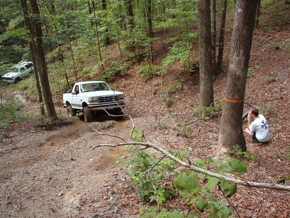 The pictures just don't show how steep this is - Troy's truck (the red one deep in the background) is on fairly level ground.  I'll upload the video Greg is shooting later.