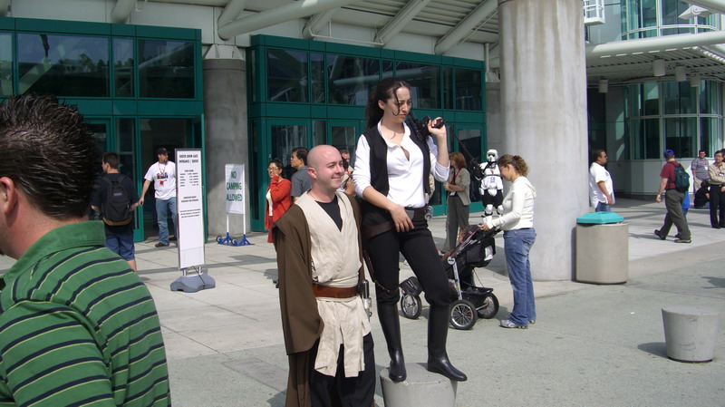 People in Star Wars costumes outside a convention center