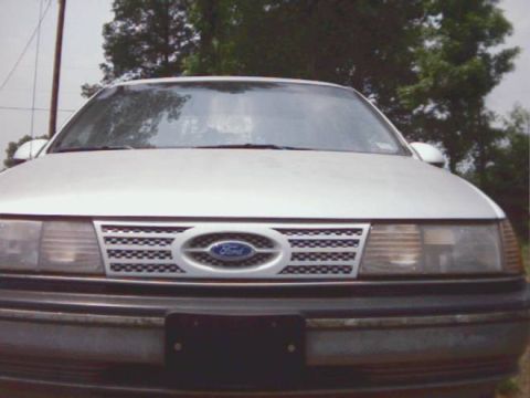 1991 Ford Taurus - This is my front grill that I made close to the police grill and used diamond aluminum grill inserts you can see that I started painting th…