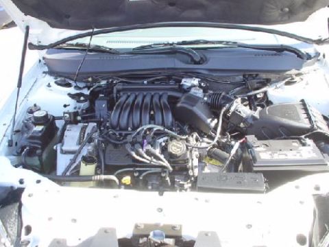 1991 Ford Taurus - picture 1 of a composite upper intake from a 2002 Taurus.