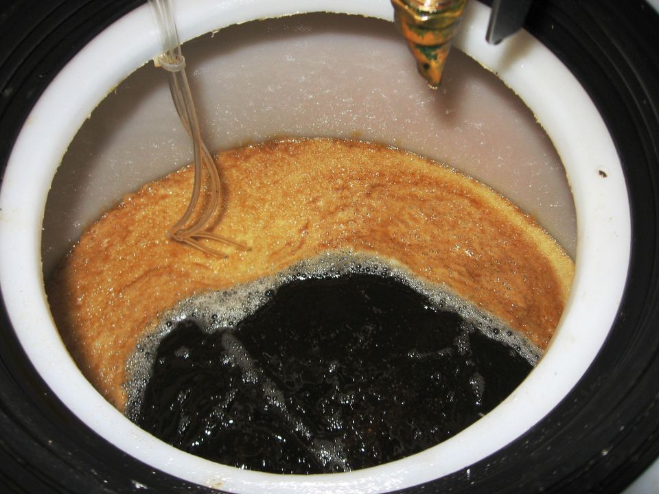 Kill the recirculation and allow the bubbler to pop the small bubbles, leaving just the floating KOH soap mat.  Its not all soap, just the dark streaks.  And this isn't all of the soap, I got another mat after firing the recirculation back up for another hour.