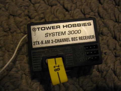 1974 Ford F-100 - This is a Tower Hobbies System 3000 2TX-R AM 2-Channel BEC Receiver, a yellow tag marked '82'.