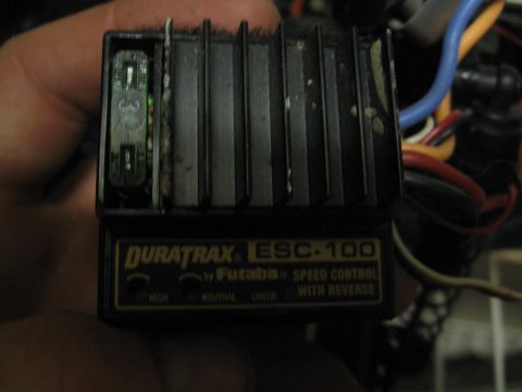 1974 Ford F-100 - Duratrax ESC-100 speed control with reverse, a visible fuse and heat sink fins.