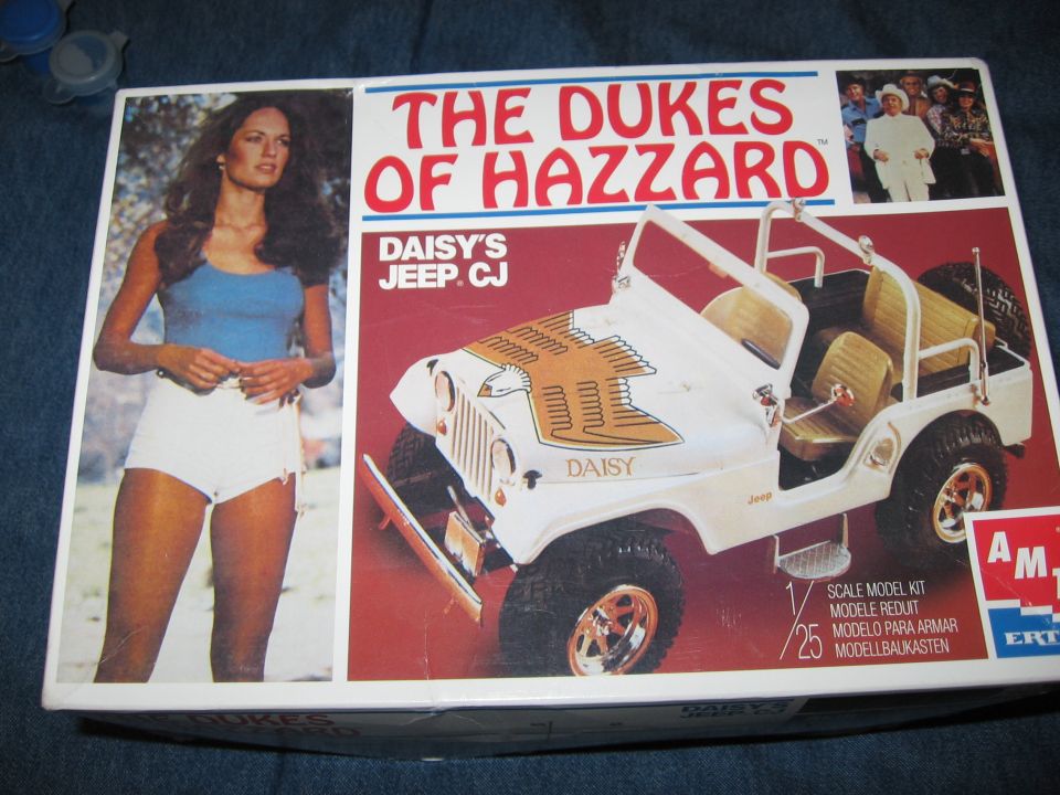 Dukes of Hazzard Daisy's Jeep CJ model kit box art with Daisy Duke