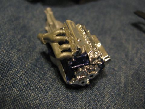 1974 Ford F-100 - A detailed model of a vehicle's engine and transmission is shown up close.