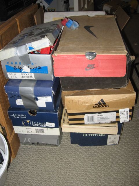 1974 Ford F-100 - Various shoe boxes are piled up in a room, with some labels visible.
