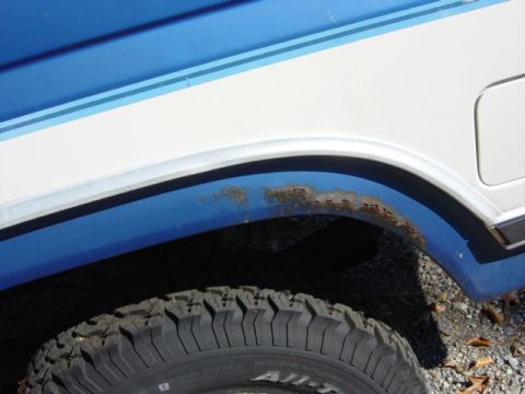 1985 Ford F-250 - Rust is visible on the wheel well of this 1985 Ford F-250.