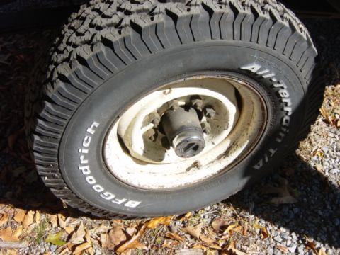 1985 Ford F-250 - Close-up of a BFGoodrich All-Terrain T/A tire mounted on a white wheel.