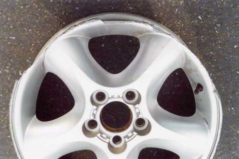 2000 Ford Taurus - Just the rim from about. Dents, scraps, and cut out all there.