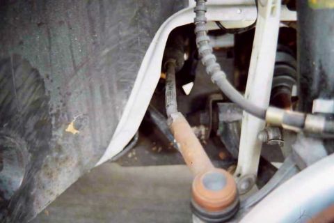 2000 Ford Taurus - My bent right side tie-rod connector. Bent right at the weak point, just as expected. Another 50 bucks too. Grrrr.