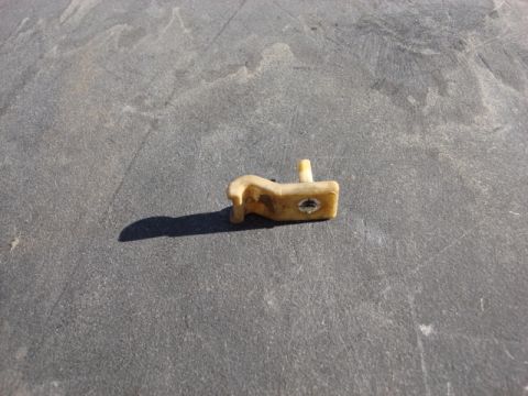 1983 Ford Bronco - Here is a side view of the stock clip it fits in a hole in the frame and then the pin spreads the clip open and holds the line to the frame.