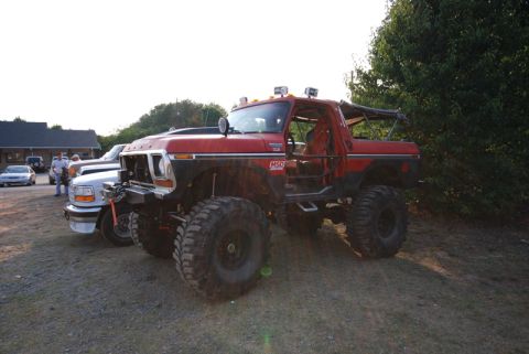 1996 Ford Bronco - This heavily modified Ford Bronco features a roll cage and oversized tires.