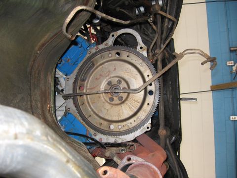1973 Ford Ranchero - Underside view of engine and transmission components, likely during a swap or repair.