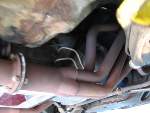 1973 Ford Ranchero - Underside view of the exhaust manifold and pipes on a 1973 Ford Ranchero.