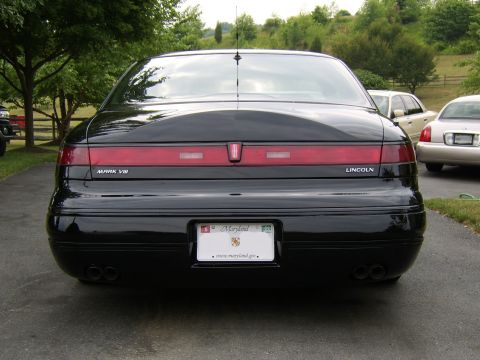1996 Mercury Grand Marquis - I installed a new set of chrome emblems to replace the aftermarket gold plated ones. I also monochromed my trunk lock cover to match the tr…