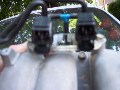 1994 Ford Probe - Fuel injectors are mounted on the intake manifold, a key component for engine performance.