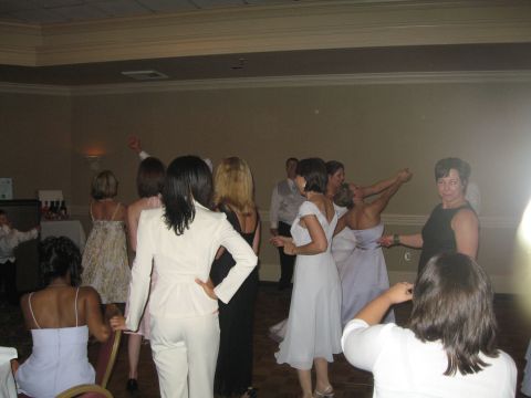 1988 Ford Bronco - Guests enjoy dancing at a wedding reception event.