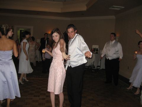 1988 Ford Bronco - Guests enjoy dancing at a wedding reception, with a watermark indicating the photo source.