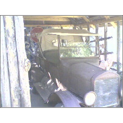 1973 Ford Ranchero - This antique automobile is covered and appears to be in storage.