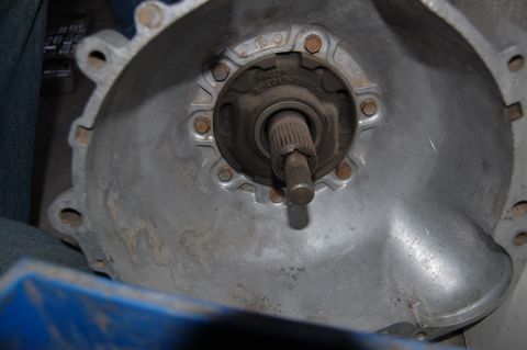 1992 Ford Explorer - Close-up of a transmission bell housing, revealing a splined shaft and metal casing.