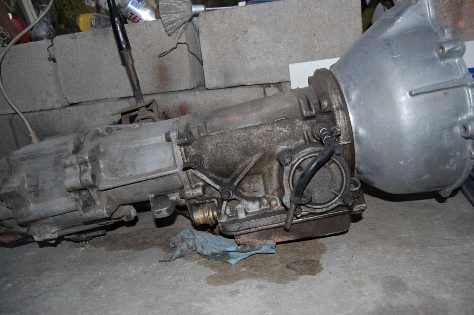 Automatic transmission with a silver bell housing and a metal shifter lever