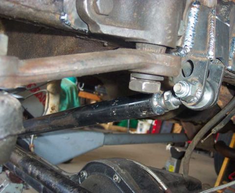 1992 Ford Mustang - Custom suspension linkage with visible bolts and welds, suggesting aftermarket modifications.
