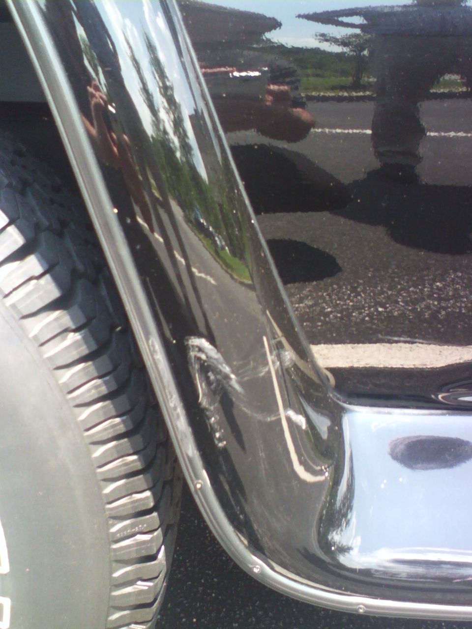 passenger side rear wheel well