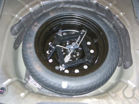 2002 Mercury Sable - wheel well. maybe a zex bottle holder in the future?