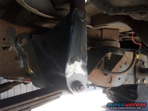 1996 Ford Bronco - Underside view of a custom suspension bracket, likely modified for off-road use.