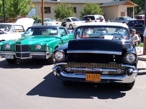 1972 Ford Ranchero - Front view of a black 1957 Chevrolet Bel Air with a Colorado license plate.