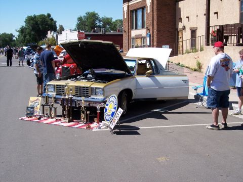 1972 Ford Ranchero - This 1977 Ford Ranchero is displayed with numerous trophies at an outdoor event.