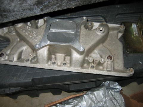 1992 Ford Mustang - Edelbrock intake manifold shown from above, with visible text and mounting holes.