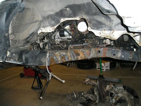 1986 Toyota Hilux - The vehicle's frame appears to have undergone significant repair work, with visible welding on the chassis.