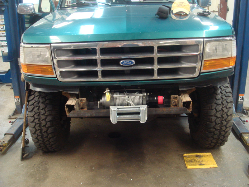 1996 Ford Bronco front end with a winch mounted below the bumper