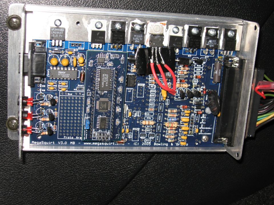 MegaSquirt V3.0 EFI ECU circuit board with components and wiring harness