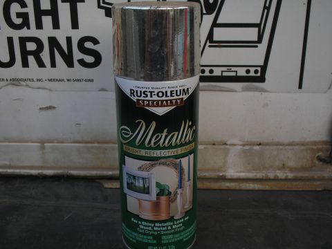 1999 Ford F-800 - A can of Rust-Oleum Specialty Metallic spray paint is shown against a textured background.