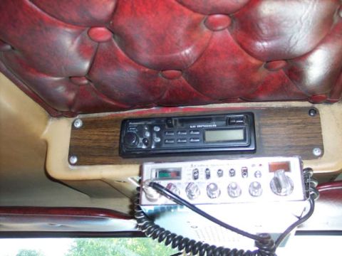 1981 Kenworth W900A - Interior view of a truck's dashboard, a CB radio and a car stereo system.